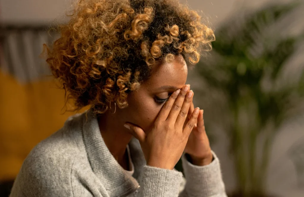 Woman frustrated and confused by divorce finances.